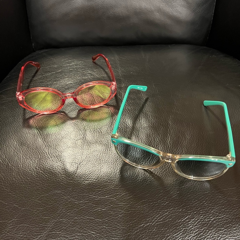 Set of two pairs of sunglasses - Betsey Johnson and Rubi. Come with cases!